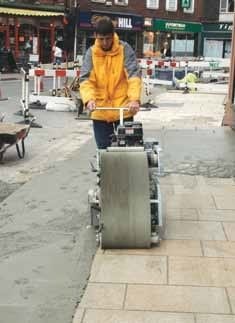 Sponge machine for paving grout