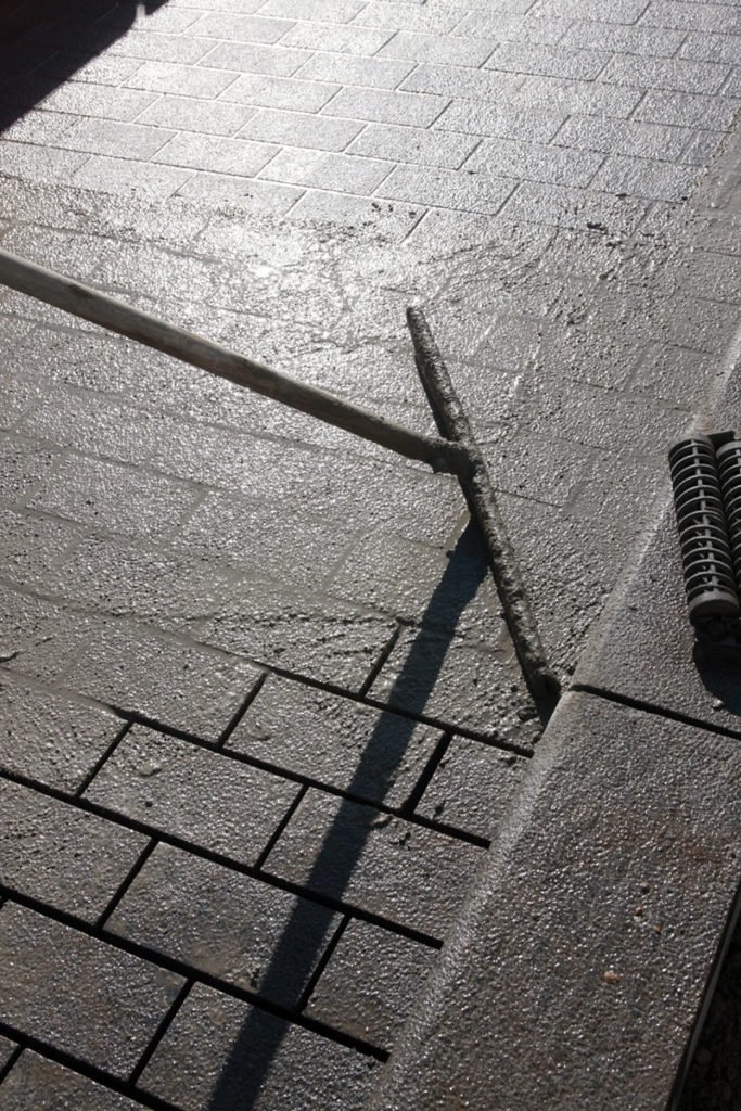 Larsen FJM Fast Jointing Mortar Being Applied