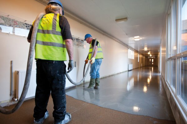 Larsen 1550 Self Levelling Screed Being Poured By Contractors